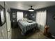 Bright bedroom with neutral walls, curtains, and a queen-sized bed at 1905 Apple St, Greenfield, IN 46140