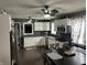 Bright kitchen featuring white cabinets, a mosaic backsplash, and a spacious layout at 1905 Apple St, Greenfield, IN 46140