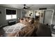 Inviting living room with plush seating, rug, and view into the kitchen at 1905 Apple St, Greenfield, IN 46140