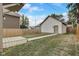Spacious backyard featuring a well-maintained lawn and a charming shed or garage at 206 N Hamilton Ave, Indianapolis, IN 46201