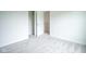 Neutrally decorated bedroom featuring plush carpeting and a walk-in closet at 206 N Hamilton Ave, Indianapolis, IN 46201