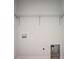 Laundry room featuring white walls, hookups, outlets, and wire shelving at 206 N Hamilton Ave, Indianapolis, IN 46201