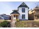 Charming two-story home boasting unique architectural details and a well-manicured front yard at 2110 N Talbott St, Indianapolis, IN 46202