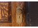 Close up of the beautifully paneled front door with decorative hardware at 2110 N Talbott St, Indianapolis, IN 46202