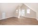 The living room is bright and airy, featuring hardwood floors and a back door at 2110 N Talbott St, Indianapolis, IN 46202