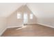 The living room features hardwood floors, natural light, and a rear entry door at 2110 N Talbott St, Indianapolis, IN 46202