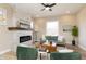 Inviting living room with a fireplace, comfortable seating, and natural light enhancing the ambiance at 2110 N Talbott St, Indianapolis, IN 46202