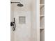 Tiled shower features a rainfall shower head, built-in niche, and floating shelves at 2110 N Talbott St, Indianapolis, IN 46202
