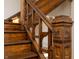 Detailed view of the ornate wooden staircase with decorative carvings at 2110 N Talbott St, Indianapolis, IN 46202