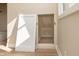 Storage area beneath a staircase with an open door to reveal the interior storage space at 2110 N Talbott St, Indianapolis, IN 46202