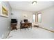 Bright bedroom showcasing natural light, neutral colors, and a wood desk at 21360 Oakview Dr, Noblesville, IN 46062