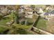 Aerial view of a home with a backyard pool, mature landscaping, and wooden fence at 21360 Oakview Dr, Noblesville, IN 46062