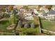 Areal shot showcases pool, backyard, and home situated among beautiful trees at 21360 Oakview Dr, Noblesville, IN 46062