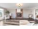 Inviting living room with a cozy brick fireplace and comfortable seating at 21360 Oakview Dr, Noblesville, IN 46062