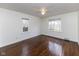 Bright and airy bedroom featuring beautiful hardwood floors and abundant natural light at 3233 E 48Th St, Indianapolis, IN 46205