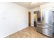 Efficient kitchen featuring stainless steel appliances, tile flooring, and ample storage space at 3233 E 48Th St, Indianapolis, IN 46205