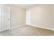 Bright and airy bedroom with soft carpeting and two entry doors at 3841 Constitution Dr, Carmel, IN 46032