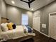 Cozy bedroom featuring a ceiling fan, a large closet, and hardwood floors at 422 Johnson Ave, Franklin, IN 46131