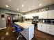 Spacious kitchen featuring granite countertops, stainless steel appliances, and a center island at 422 Johnson Ave, Franklin, IN 46131