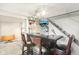 Basement bar area featuring a wooden bar, bar stools, and mounted TV at 455 Meadowview Ln, Greenwood, IN 46142