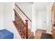 Entryway featuring hardwood floors, staircase, and a front door with side windows at 455 Meadowview Ln, Greenwood, IN 46142
