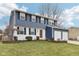 Beautiful two-story home with a tidy front lawn and an attached two-car garage at 455 Meadowview Ln, Greenwood, IN 46142