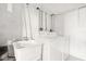 Functional laundry room with a sink, washer, dryer, and white walls at 455 Meadowview Ln, Greenwood, IN 46142