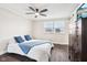 Comfortable main bedroom with a ceiling fan and TV on the dresser at 455 Meadowview Ln, Greenwood, IN 46142