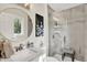 A sleek and modern bathroom features a glass-enclosed shower at 502 Ironwood Dr, Carmel, IN 46033