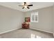 Neutral bedroom with ceiling fan and carpet flooring at 502 Ironwood Dr, Carmel, IN 46033