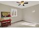 Neutral bedroom with ceiling fan and carpet flooring at 502 Ironwood Dr, Carmel, IN 46033