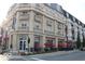 Elegant exterior of The Pint Room building with balconies, outdoor seating, and inviting storefront at 502 Ironwood Dr, Carmel, IN 46033