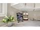 Kitchen detail with white cabinets, marble countertops, and stainless steel appliances at 502 Ironwood Dr, Carmel, IN 46033