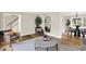 Bright and airy living room featuring hardwood floors, neutral walls, and modern decor at 502 Ironwood Dr, Carmel, IN 46033