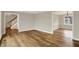 Spacious living room features hardwood floors and neutral color scheme at 502 Ironwood Dr, Carmel, IN 46033