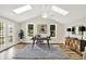Bright office with vaulted ceilings, skylights, and modern decor offering a flexible workspace at 502 Ironwood Dr, Carmel, IN 46033