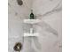 Close-up of tiled shower corner with shelves and sleek fixtures at 502 Ironwood Dr, Carmel, IN 46033