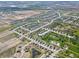 Aerial view of residential community with numerous ponds, walking paths, and green spaces at 5145 Cartland Dr, Indianapolis, IN 46239