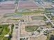 Aerial view of new housing development with ponds and green spaces throughout the community at 5145 Cartland Dr, Indianapolis, IN 46239