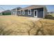 Spacious new home backyard with sod and small patio area at 5145 Cartland Dr, Indianapolis, IN 46239