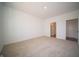 This spacious bedroom boasts plush carpet and access to an en-suite bathroom at 5145 Cartland Dr, Indianapolis, IN 46239