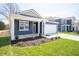Well-maintained single-Gathering home with a manicured front yard and a two-car garage at 5145 Cartland Dr, Indianapolis, IN 46239