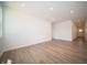 Spacious open-concept living room and entryway, featuring recessed lighting and hardwood floors at 5145 Cartland Dr, Indianapolis, IN 46239