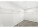 Walk-in closet boasts ample storage with wire shelving to maximize space at 5421 Landing Place Ln, Noblesville, IN 46062