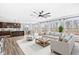 Open concept living room and kitchen area featuring stainless steel appliances and hardwood flooring at 5421 Landing Place Ln, Noblesville, IN 46062