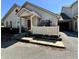 Charming townhouse featuring a covered porch and attached garage at 5451 Kelvington Ln, Indianapolis, IN 46254