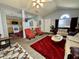 Open concept living room showing connection to the kitchen at 5451 Kelvington Ln, Indianapolis, IN 46254