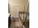 A well-maintained bathroom with a tub, a shower, and a single sink vanity at 5801 Safari Dr, Indianapolis, IN 46237