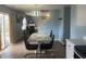 Open-concept living room with tile flooring, adjacent to the kitchen area at 5801 Safari Dr, Indianapolis, IN 46237