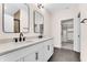 Double sink bathroom features modern fixtures, great lighting and lots of storage at 5862 Harbour Town Dr, Noblesville, IN 46062